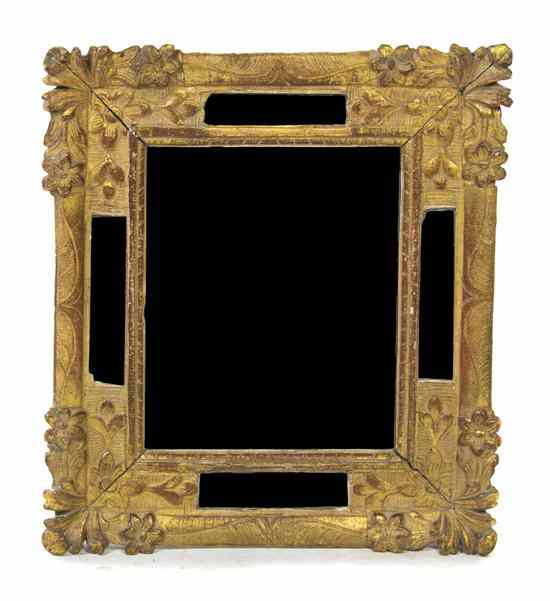 Appraisal: A Gilt Mirror having a rectangular plate within a floral