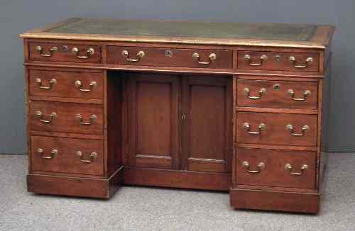 Appraisal: A late Victorian mahogany kneehole desk by Wilkie Nassau Street