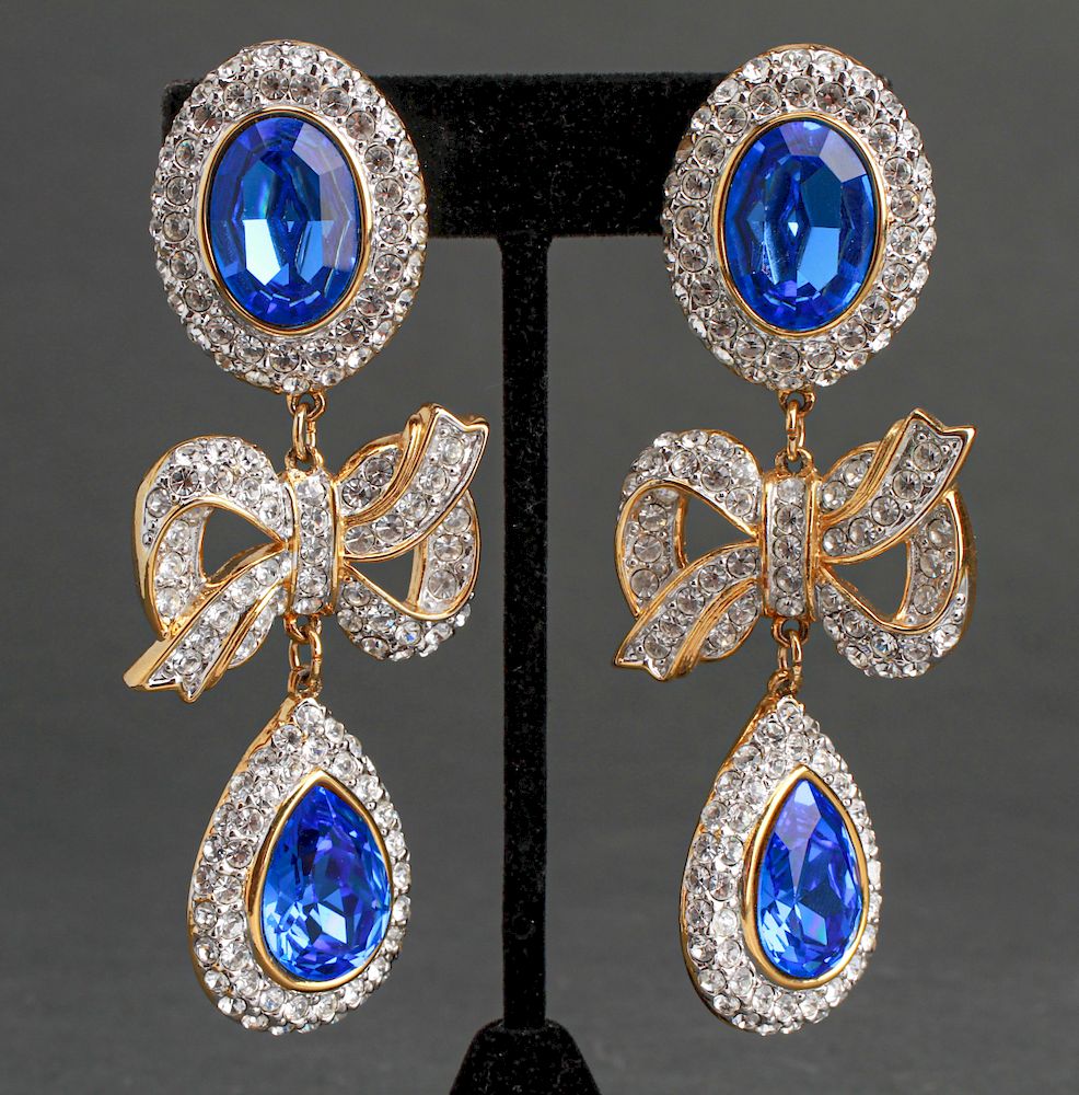 Appraisal: Valentino Faux-Sapphire Rhinestone Bow Earrings Valentino oversized faux-sapphire and rhinestone