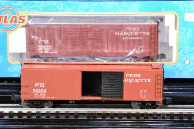 Appraisal: ATLAS FREIGHT CARS - RAILIncluding two identical Pere Marquette Box