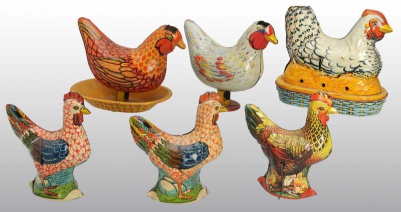 Appraisal: Lot of Tin Litho Rooster Toys Description American One marked