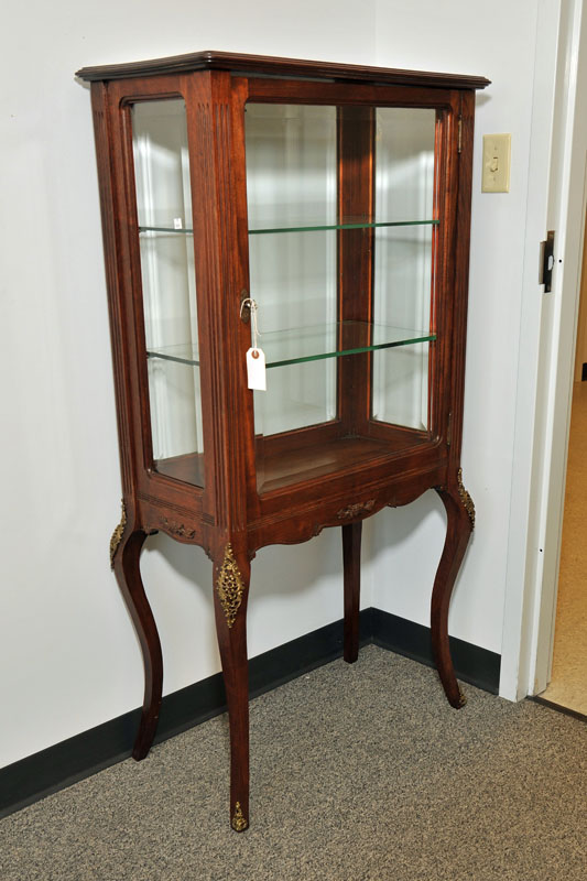 Appraisal: CURIO CABINET Walnut rectangular shaped cabinet having fluted columns two