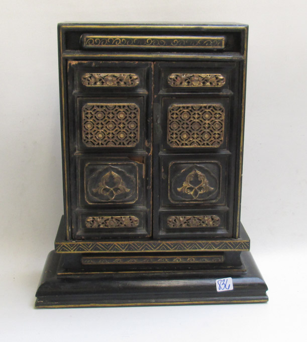 Appraisal: CHINESE BLACK AND GILT LACQUERED ALTAR CABINET having carved panel