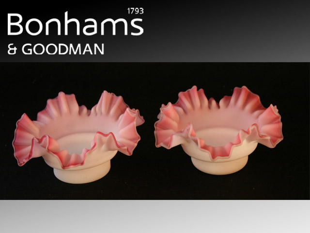 Appraisal: A pair of Victorian frilled sweetmeat dishes in pink overlay