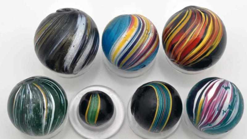 Appraisal: Lot of Indian Swirl Marbles Description Includes one aqua glass