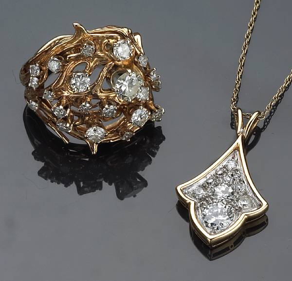 Appraisal: A diamond and k gold ring and pendant with chain