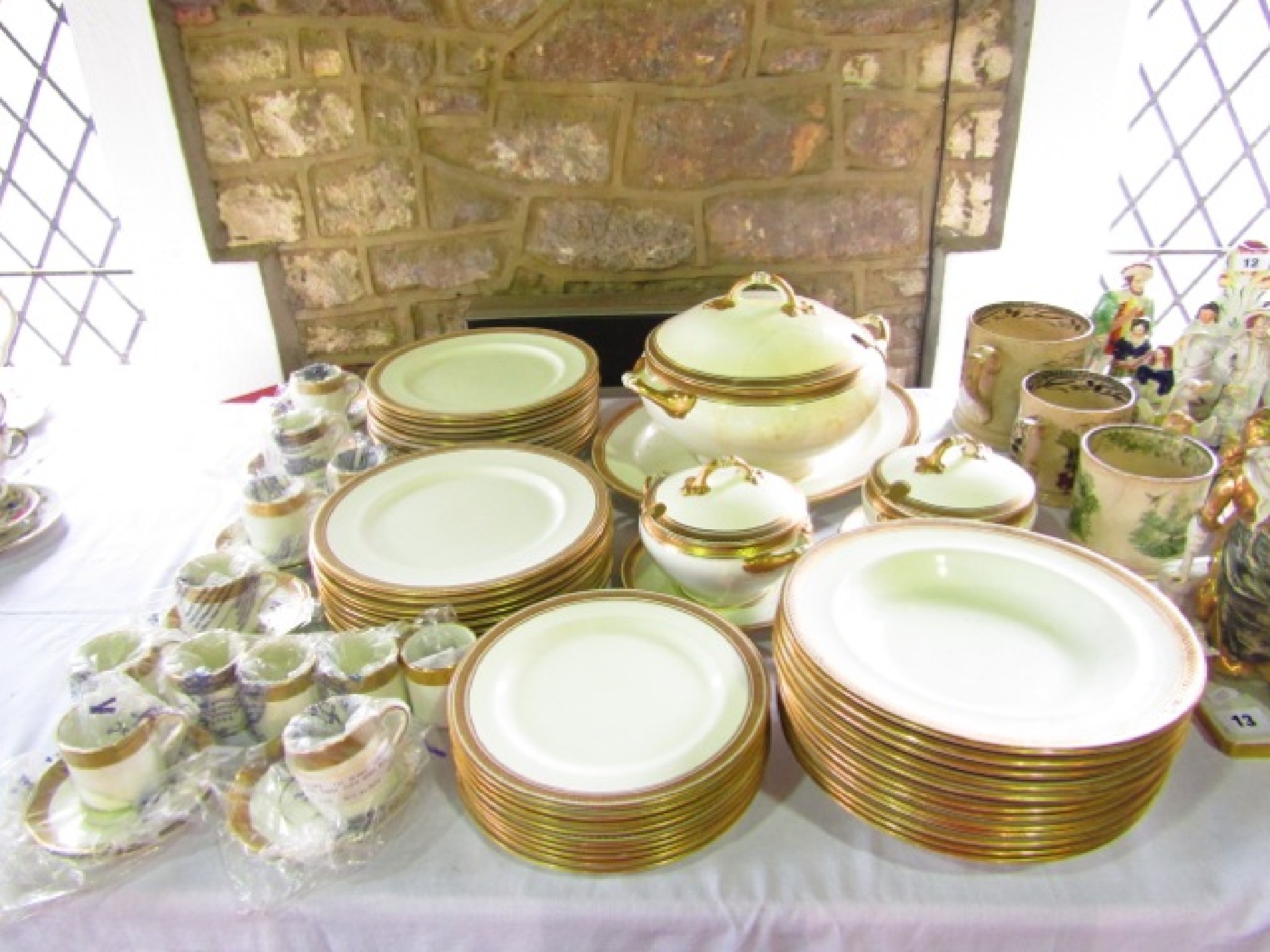 Appraisal: A collection of Aynsley dinner wares with black and gilt