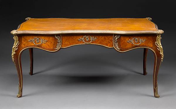 Appraisal: A Louis XV style gilt bronze mounted parquetry inlaid kingwood