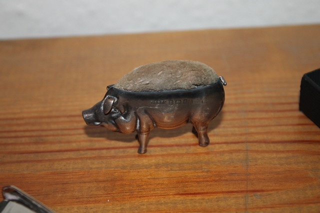 Appraisal: A SILVER PIN CUSHION in the form of a pig