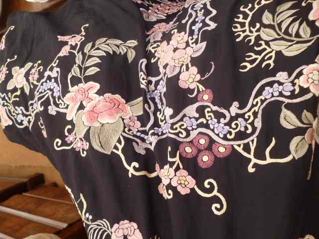 Appraisal: A VICTORIAN BLACK POSSIBLY SILK SHAWL with flower decoration square