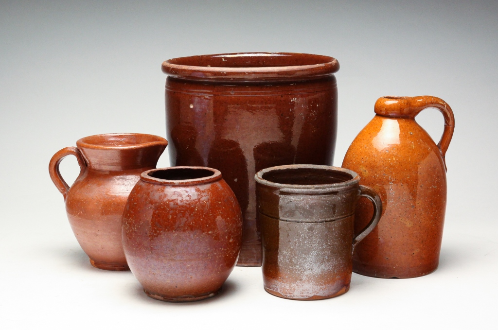 Appraisal: FIVE PIECES OF AMERICAN REDWARE Mid th century Ovoid jar