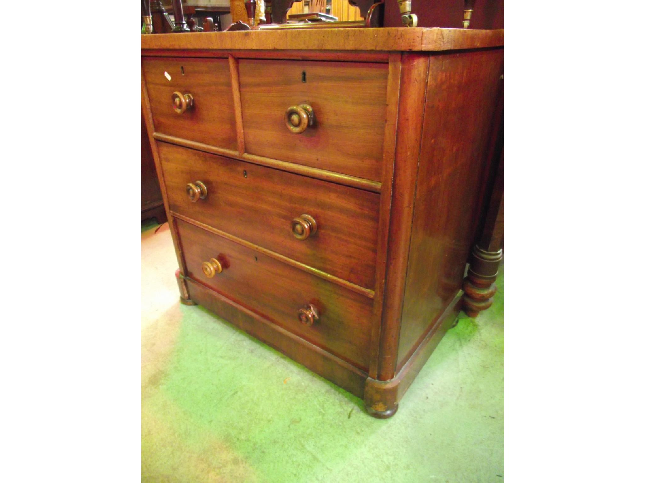 Appraisal: A small Victorian mahogany bedroom chest of two long and