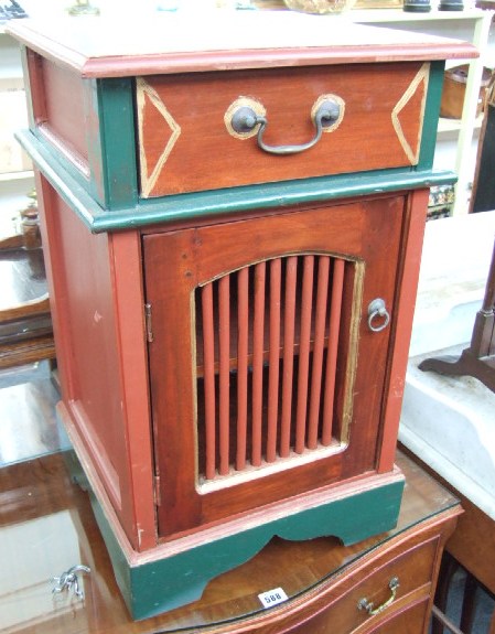 Appraisal: A painted hardwood bedside table with single drawer over cupboard