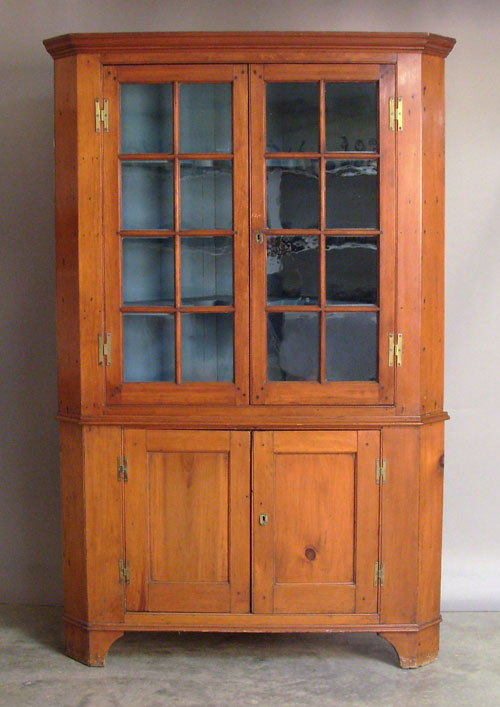 Appraisal: Pennsylvania pine two part corner cupboard th c h w