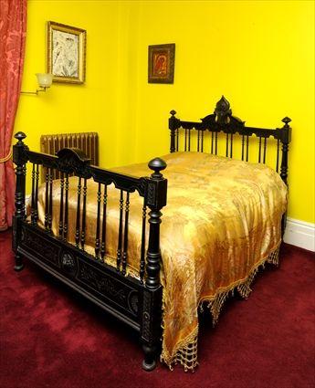 Appraisal: RENAISSANCE REVIVAL INCISED AND EBONIZED BEDSTEAD The headboard with arched