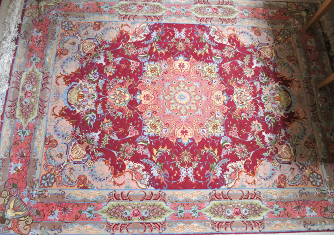 Appraisal: HAND KNOTTED PERSIAN WOOL SILK AREA RUG floral and central