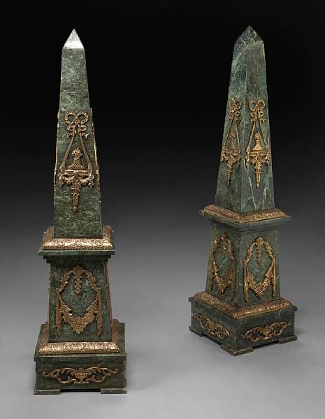 Appraisal: A pair of Empire style gilt bronze mounted marble obelisks