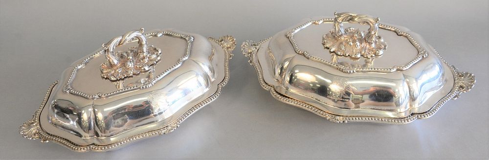 Appraisal: Pair Sheffield silver plated covered vegetable dishes with coat of