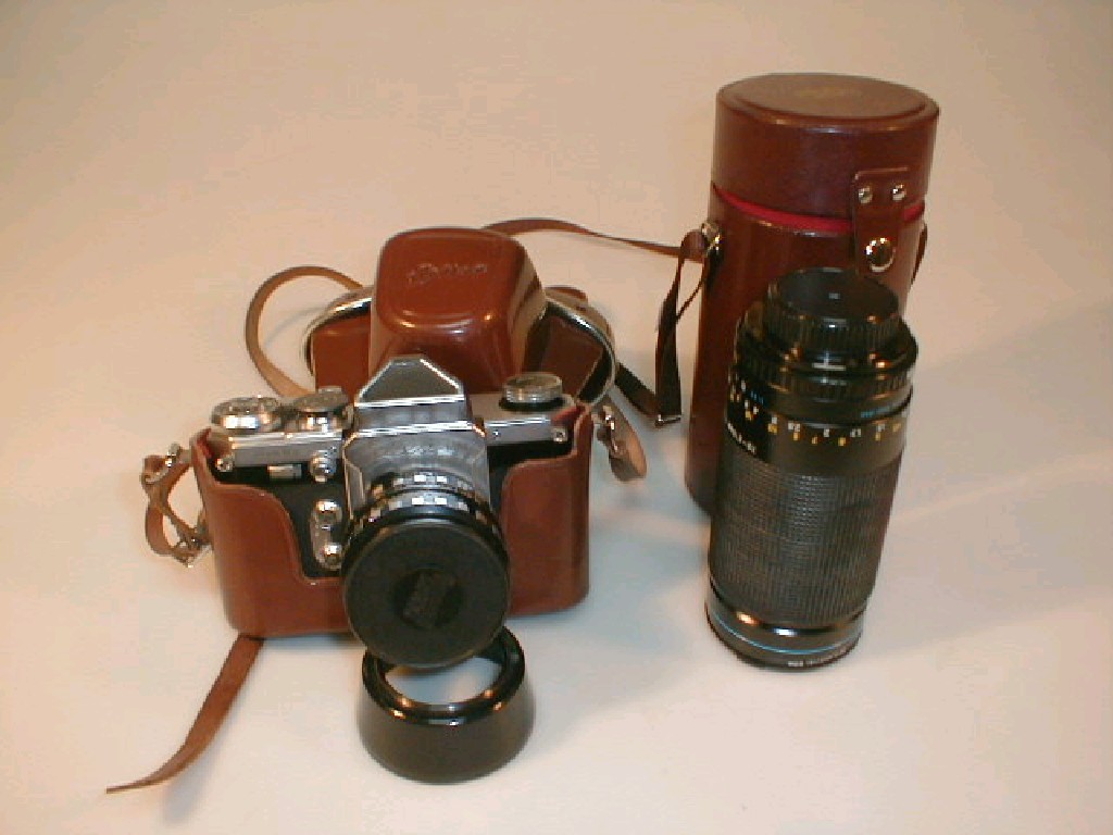 Appraisal: An Edixa mm camera in a leather case together with