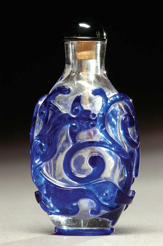 Appraisal: ANTIQUE OVERLAY GLASS SNUFF BOTTLE Well carved antique overlay glass