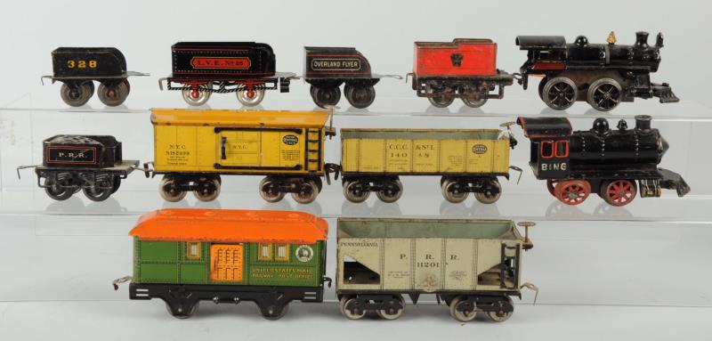 Appraisal: Lot Of Assorted Train Engines Cars This lot includes two