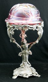 Appraisal: An Art Nouveau pewter figural lamp in the form of