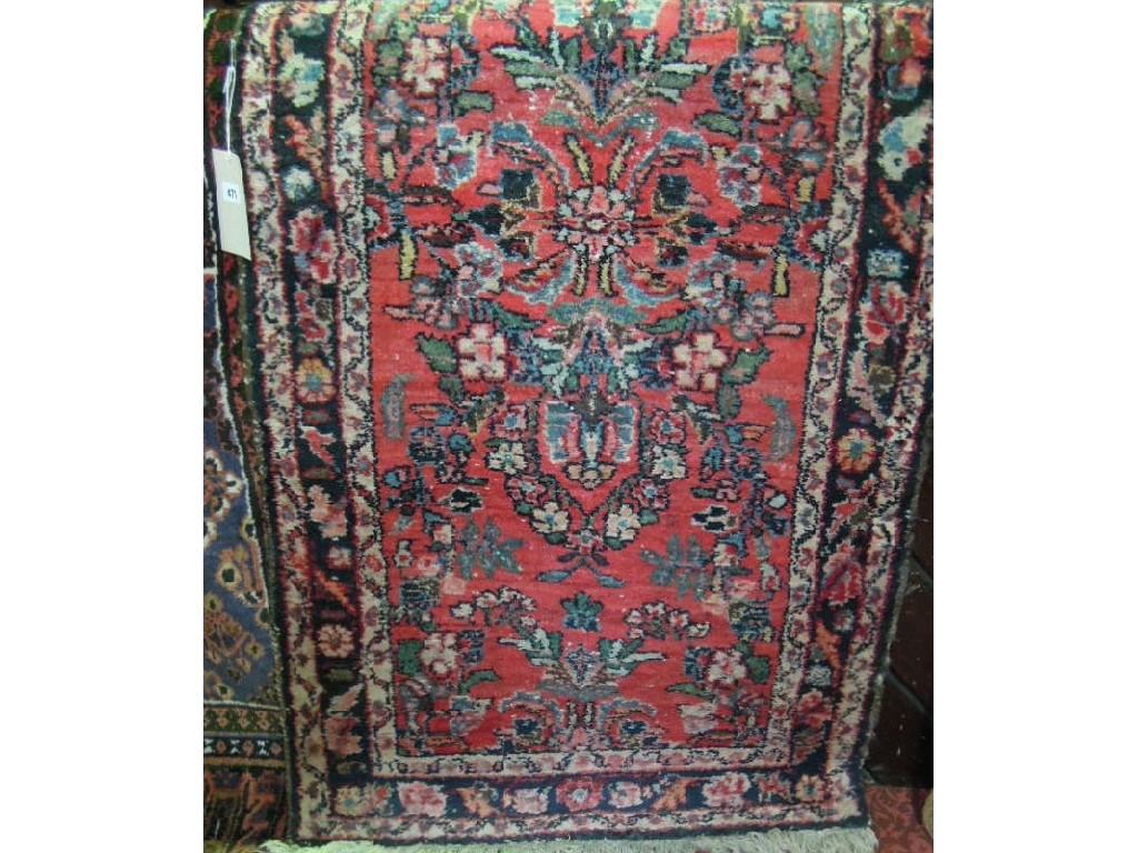 Appraisal: A Middle Eastern runner with an overall stylised floral pattern