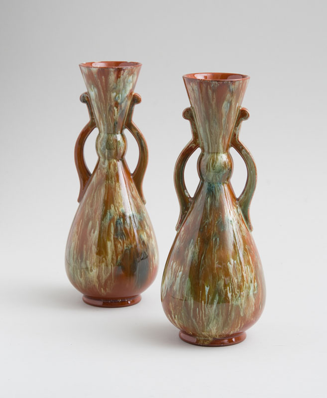 Appraisal: CHRISTOPHER DRESSER ATTRIBUTION WATCOMB TORQUAY PAIR OF VASES Glazed terracotta