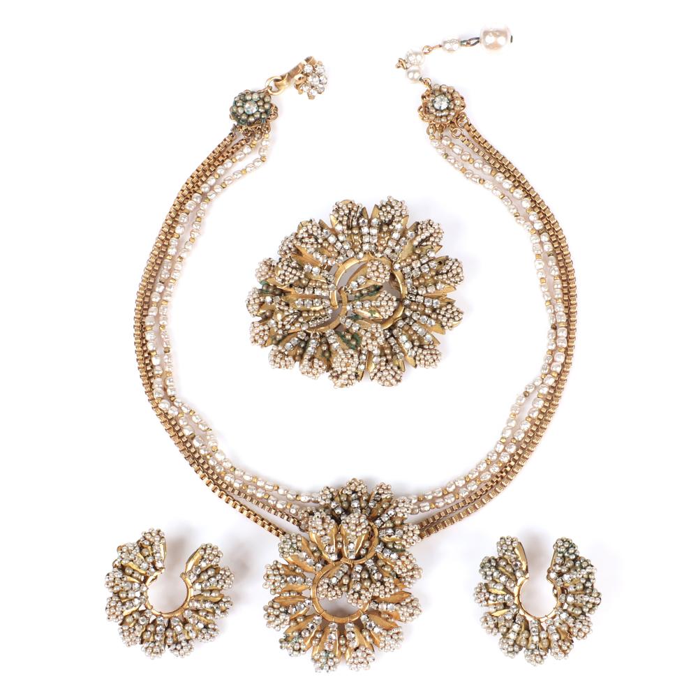 Appraisal: MIRIAM HASKELL DOUBLE SEED PEARL AND RHINESTONE SEMI CIRCLE FLOWER