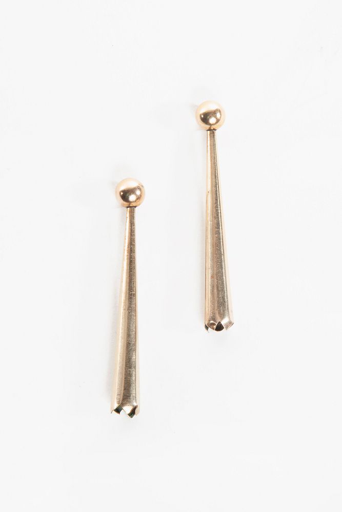 Appraisal: A Pair of Gold Bolo Tie Tips A Pair of