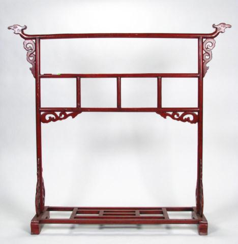 Appraisal: Vintage Oriental design floor-standing rack with serpent head carvings h