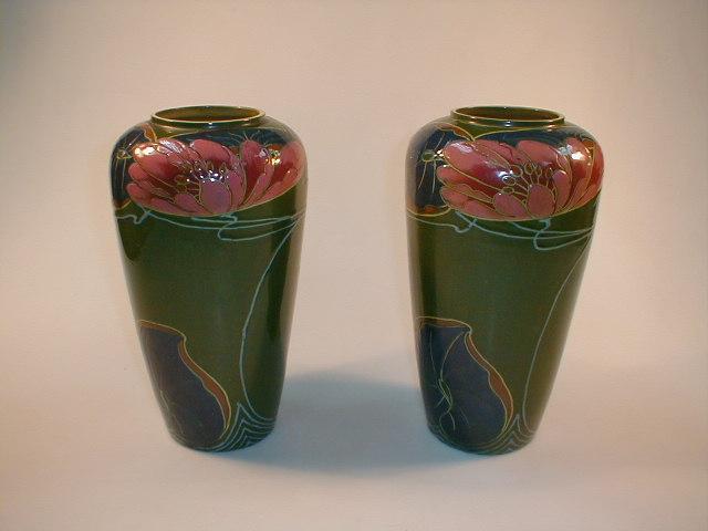 Appraisal: A pair of Secessionist period pottery vases of shouldered tapering