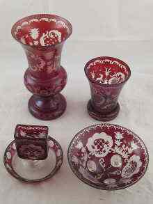 Appraisal: Four pieces of ruby flashed Continental glass each wheel engraved