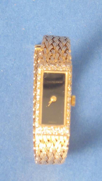 Appraisal: A Bueche-Girod Ladies Wristwatch with rectangular dial surrounded by numerous