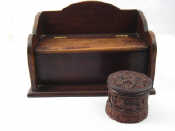 Appraisal: A mahogany ink stand the two wells under a covering