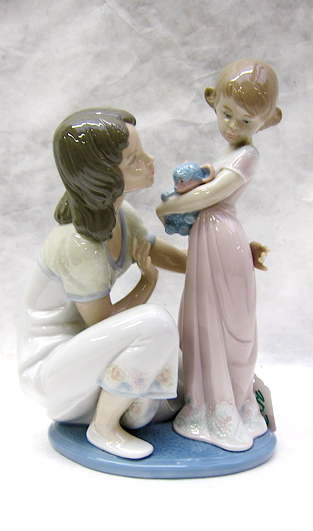 Appraisal: LLADRO PORCELAIN FIGURINE A Mother's Touch designed by Juan Huerta