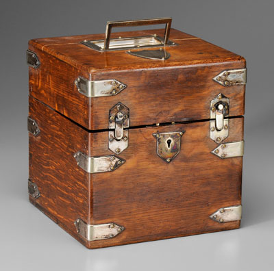 Appraisal: Oak four-bottle spirits box silver-plated mounts lined compartments housing four