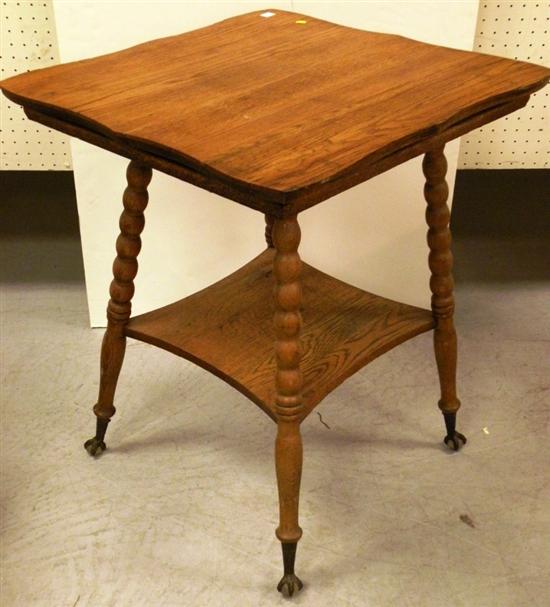 Appraisal: Oak splay leg stand stretcher shelf square top round turned