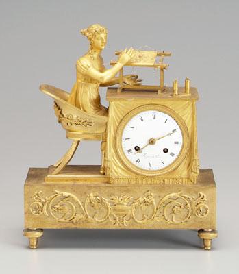 Appraisal: French Empire bronze dore clock woman seated in classically styled