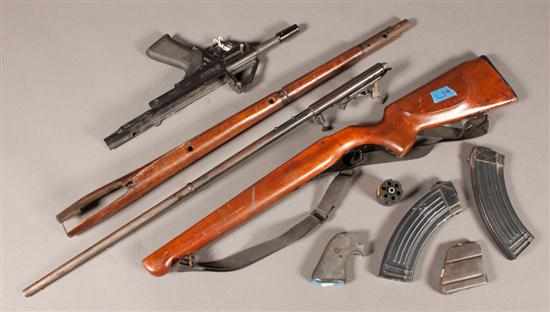 Appraisal: Miscellaneous gun parts and accessories including one rifle magazine two