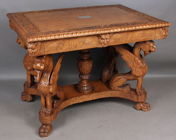 Appraisal: Late th Century Victorian handcarved cherry library table having a