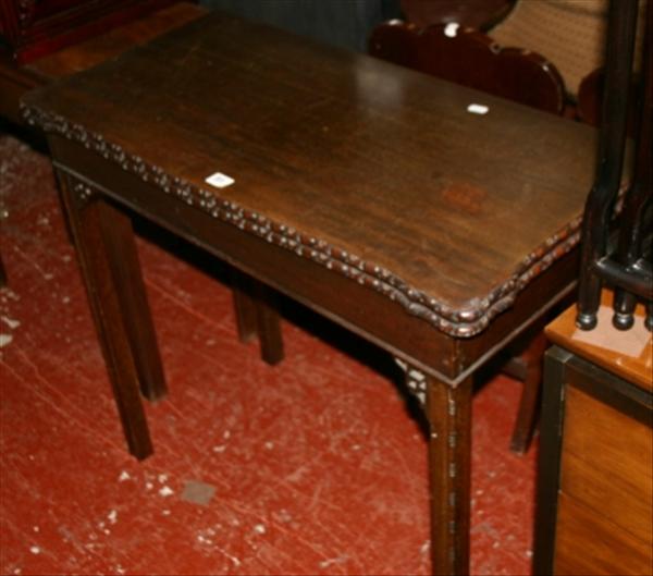 Appraisal: A th century carved mahogany card table in the Georgian