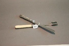 Appraisal: A bread knife and stilton scoop