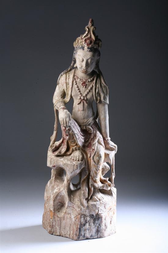 Appraisal: CHINESE POLYCHROME WOOD FIGURE OF GUANYIN Seated at ease wearing