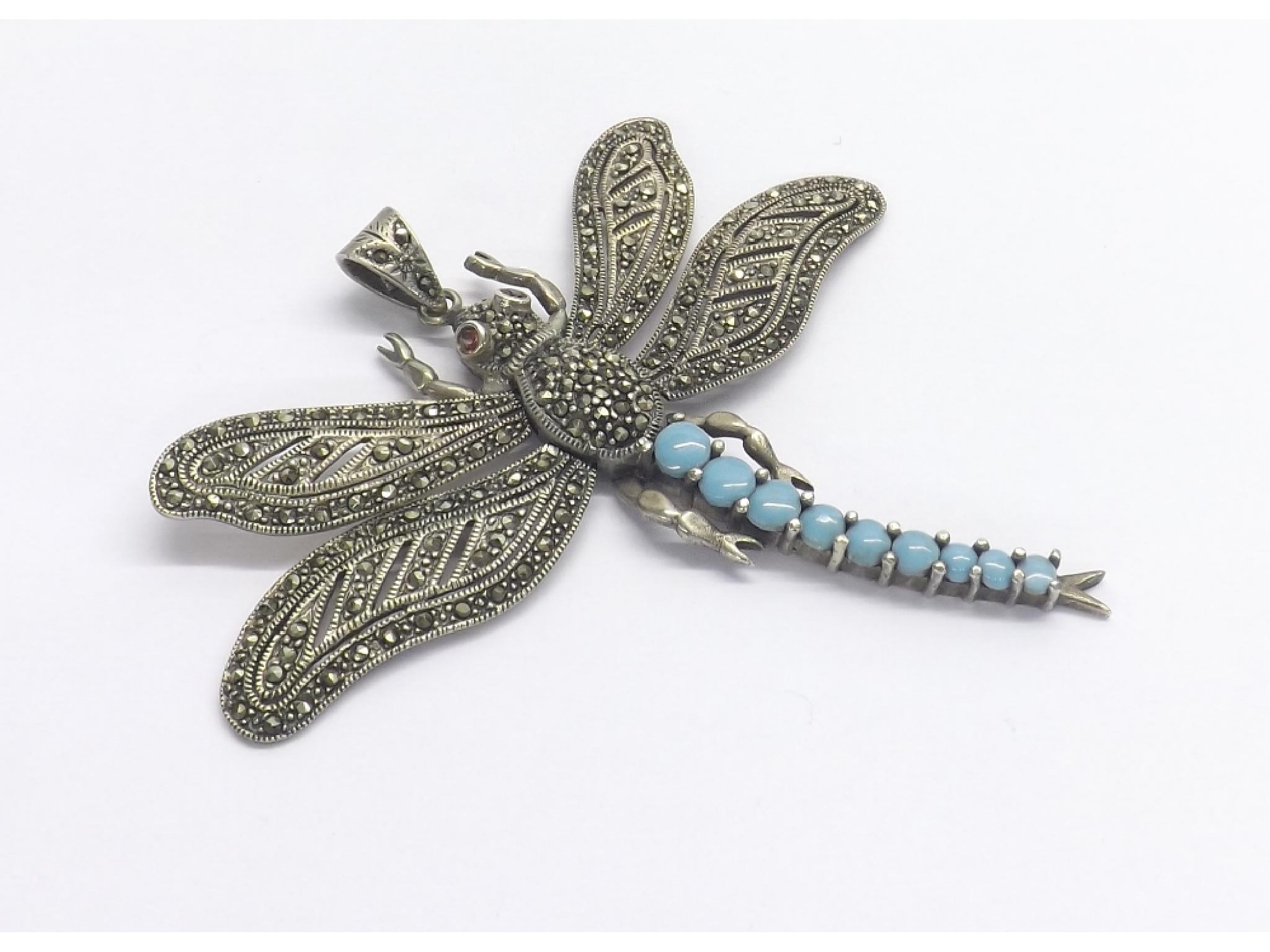 Appraisal: Novelty silver marcasite and turquoise coloured stone set dragonfly pendant