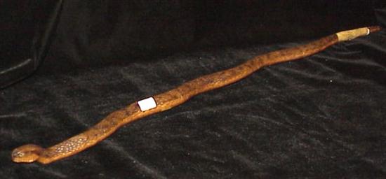 Appraisal: Snake walking stick finely carved l needs repair last of