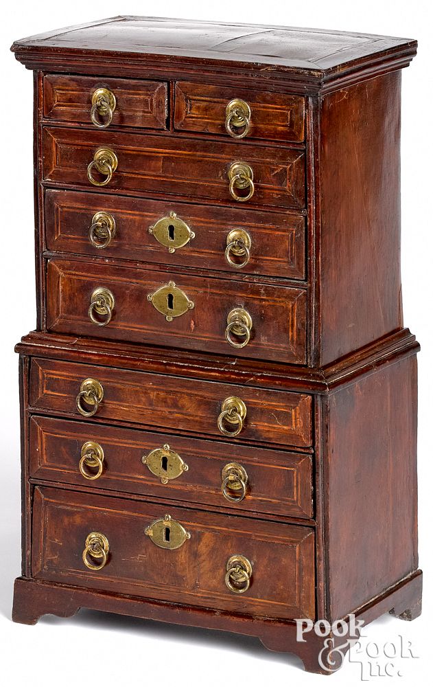 Appraisal: Miniature George III mahogany chest on chest th Miniature George