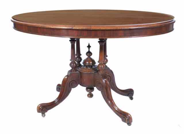 Appraisal: A VICTORIAN MAHOGANY TILT TOP BREAKFAST TABLE the oval top