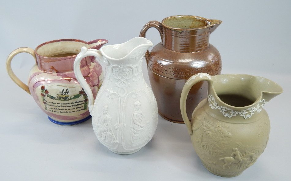 Appraisal: Four thC ceramic jugs to include a drabware jug decorated