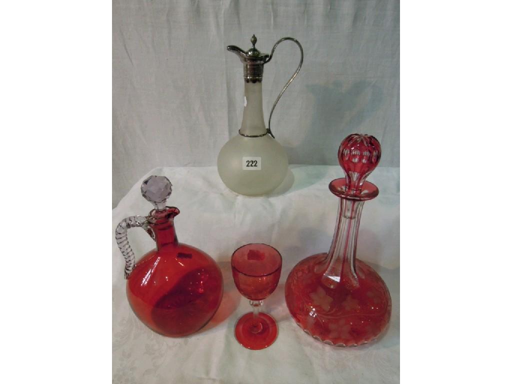 Appraisal: A Victorian cranberry overlaid glass decanter with drawn neck and